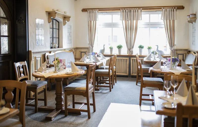 Gem&uuml;tliche Kachelstube im Sylter Stil im Restaurant Wardenburger Hof